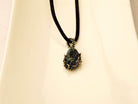 black tourmaline necklace angle view raw dark crystal jewelry