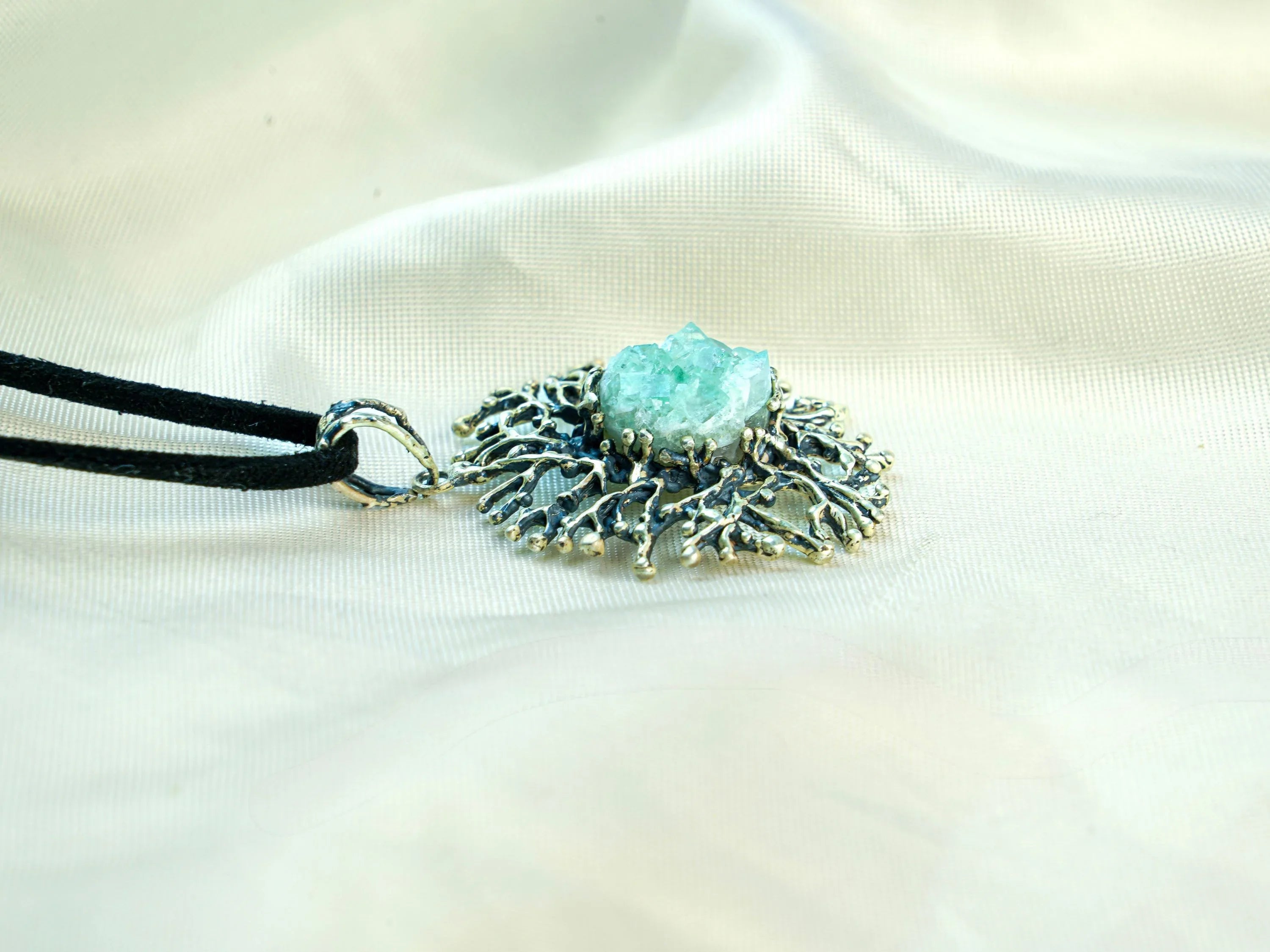 Aquamarine necklace flat lay angle sterling silver pendant jewelry