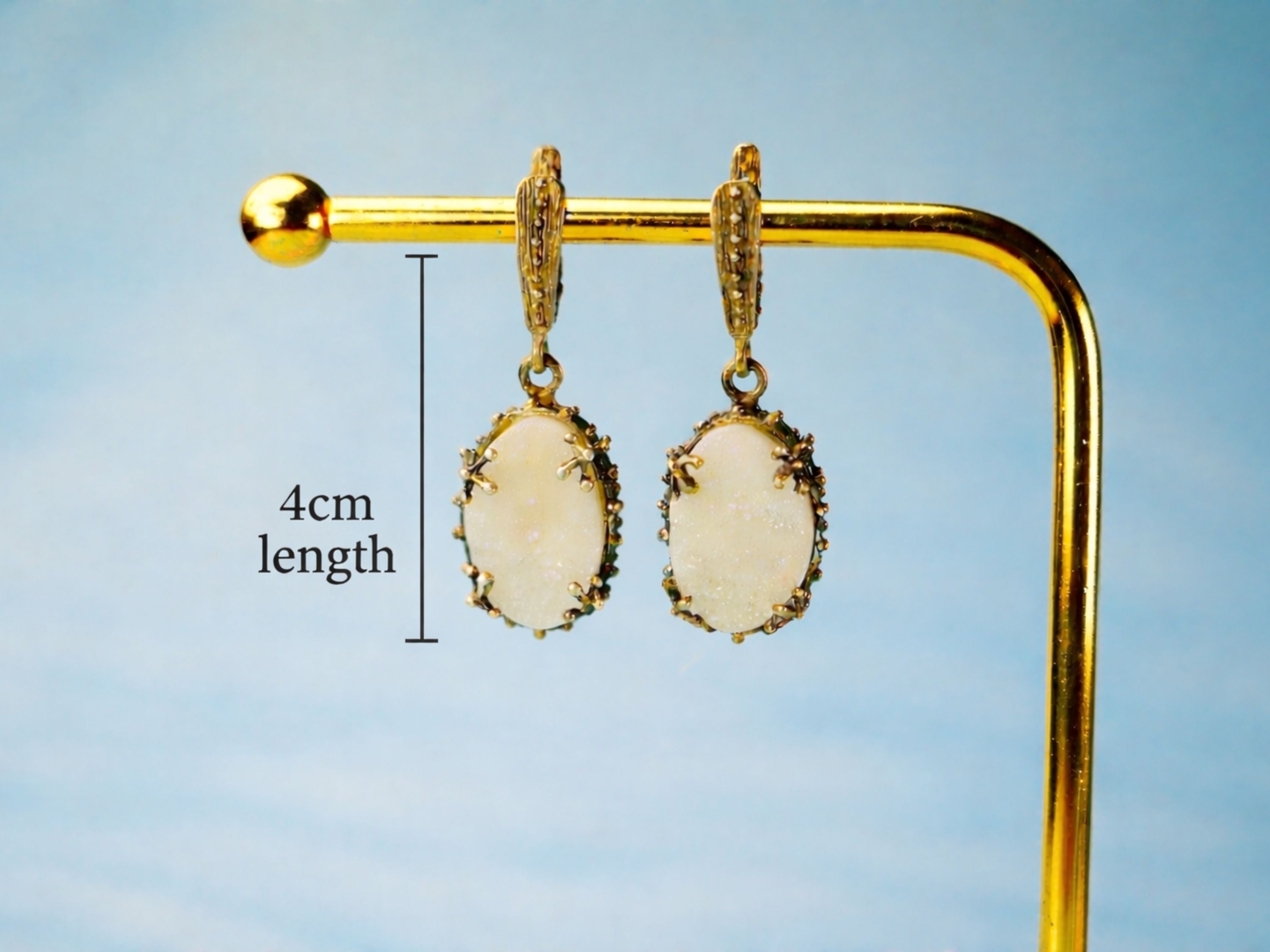 Side profile moonstone drop earrings length and structure silver earrings detail