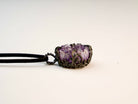 amethyst pendant side profile, raw crystal depth and silver setting detail