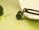 malachite pendant profile view green gemstone silver necklace