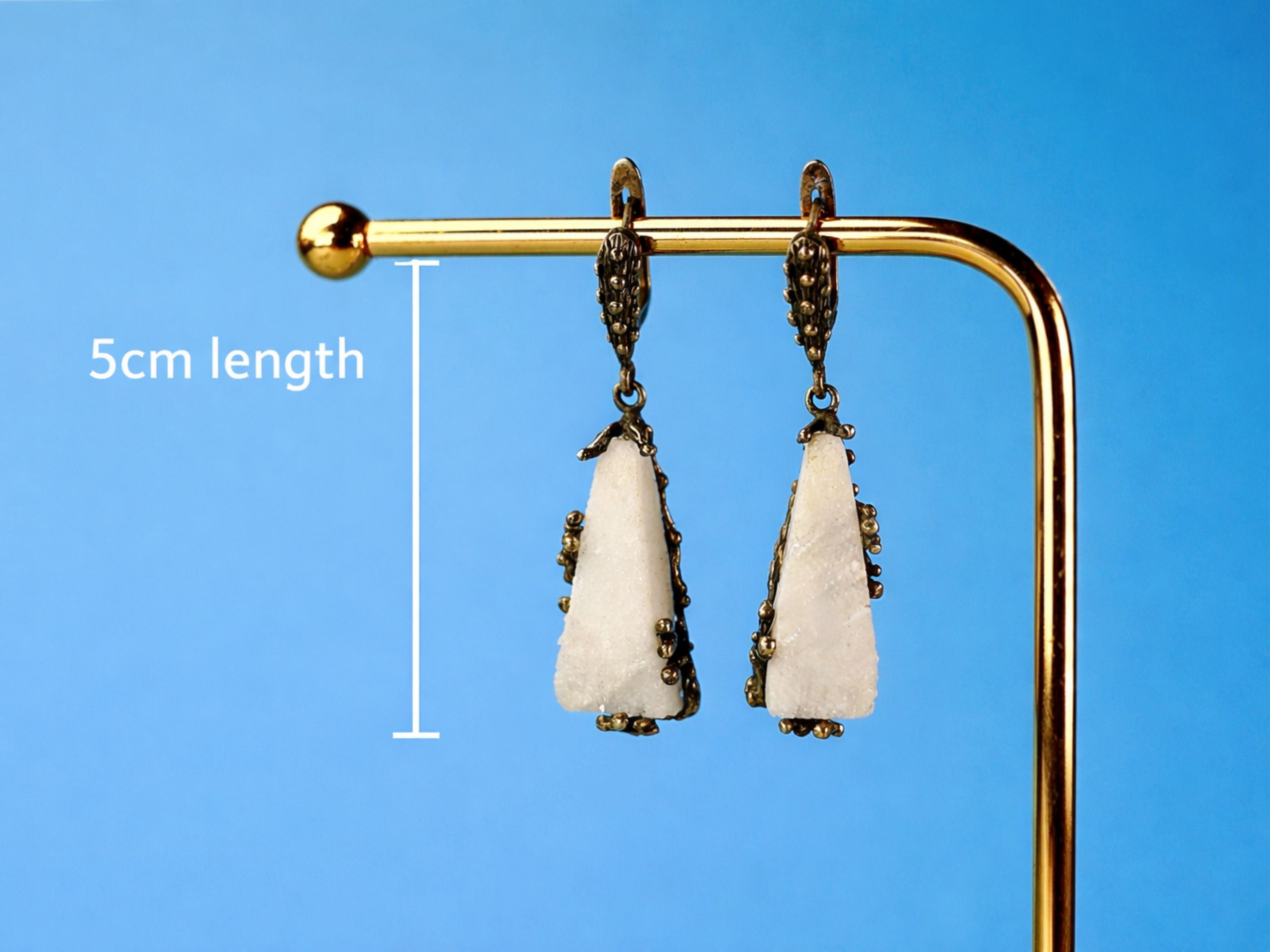 Side profile moonstone earrings length and structure silver drop earrings detail