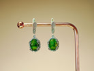 Side profile jade earrings leverback closure silver structure detail