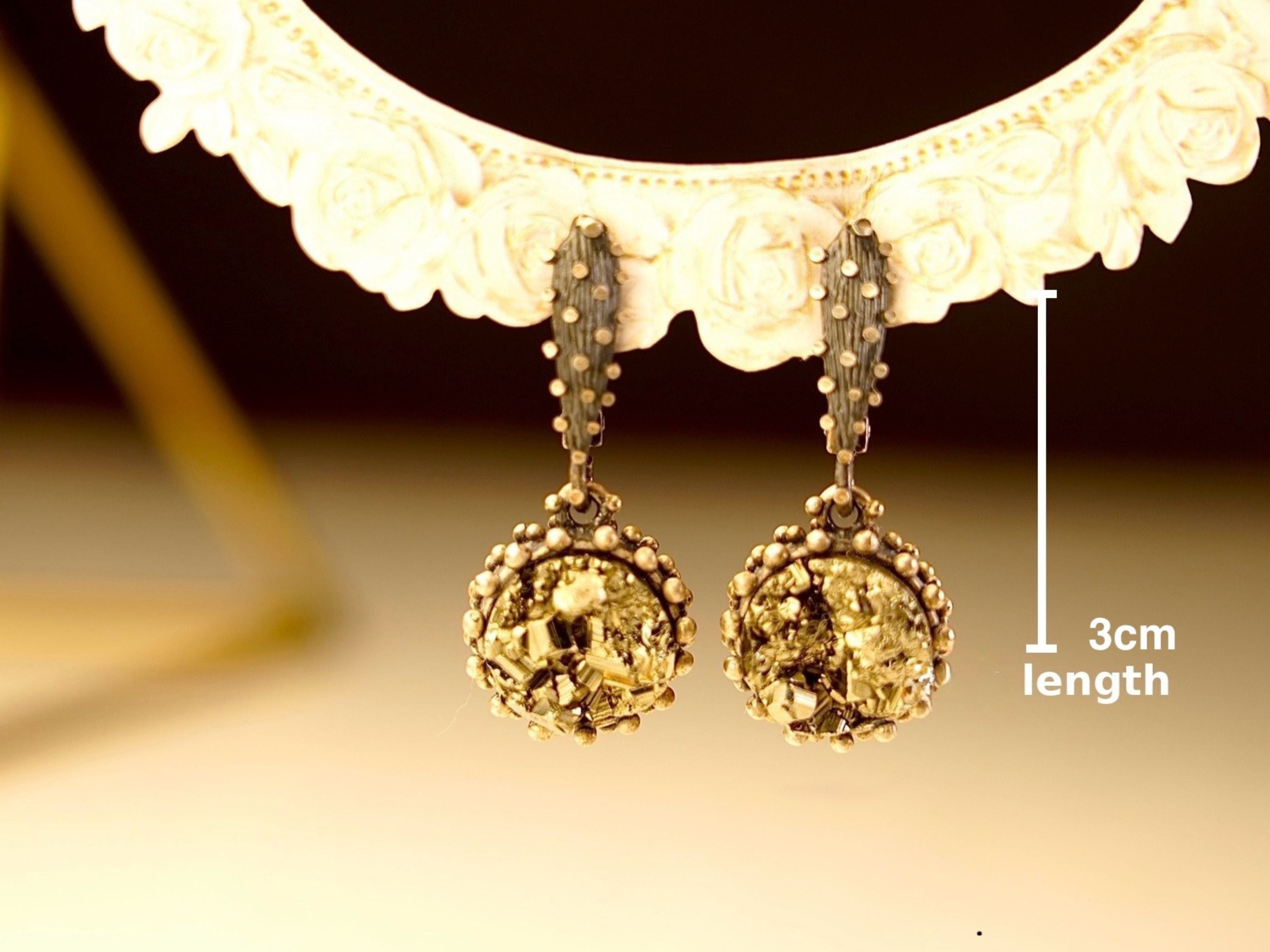 Side profile pyrite earrings length and structure silver jewelry detail