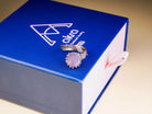 Rose quartz branch ring presented on an Akra Gems premium blue luxury gift box