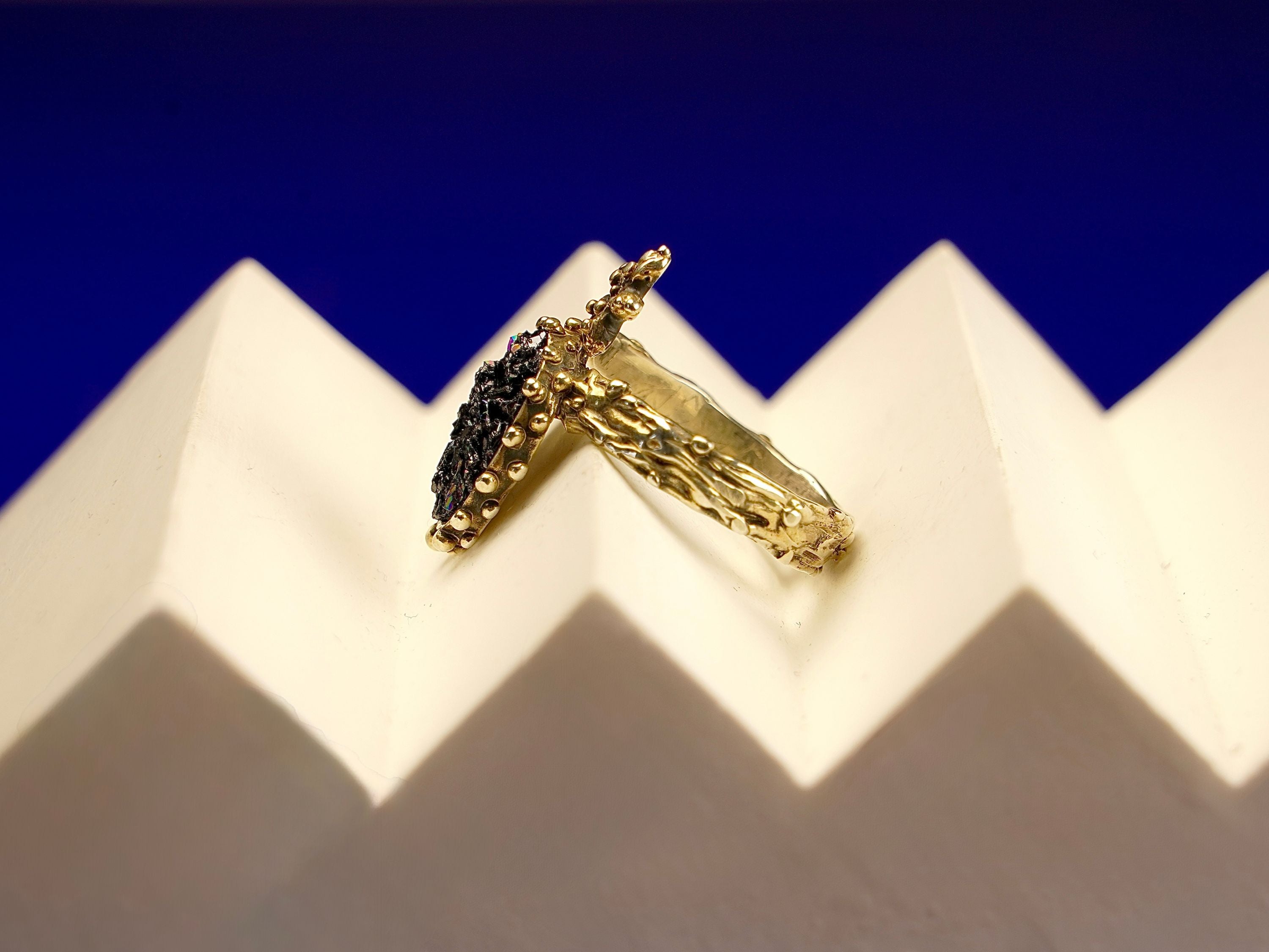 Backside tourmaline ring craftsmanship silver setting detailed view