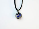 backside of lapis lazuli pendant, clean sterling silver craftsmanship