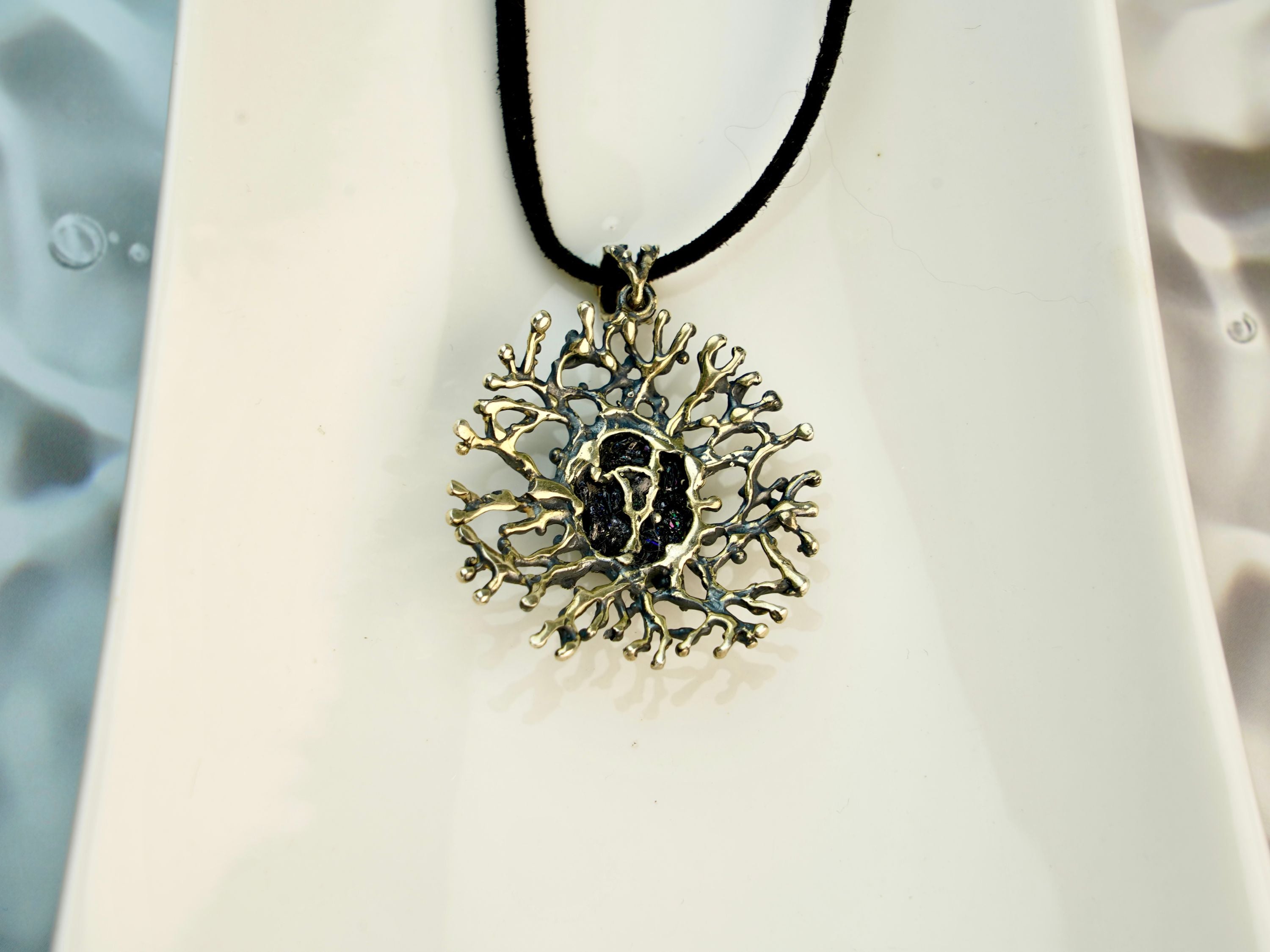 backside of tourmaline pendant, handcrafted sterling silver jewelry detail