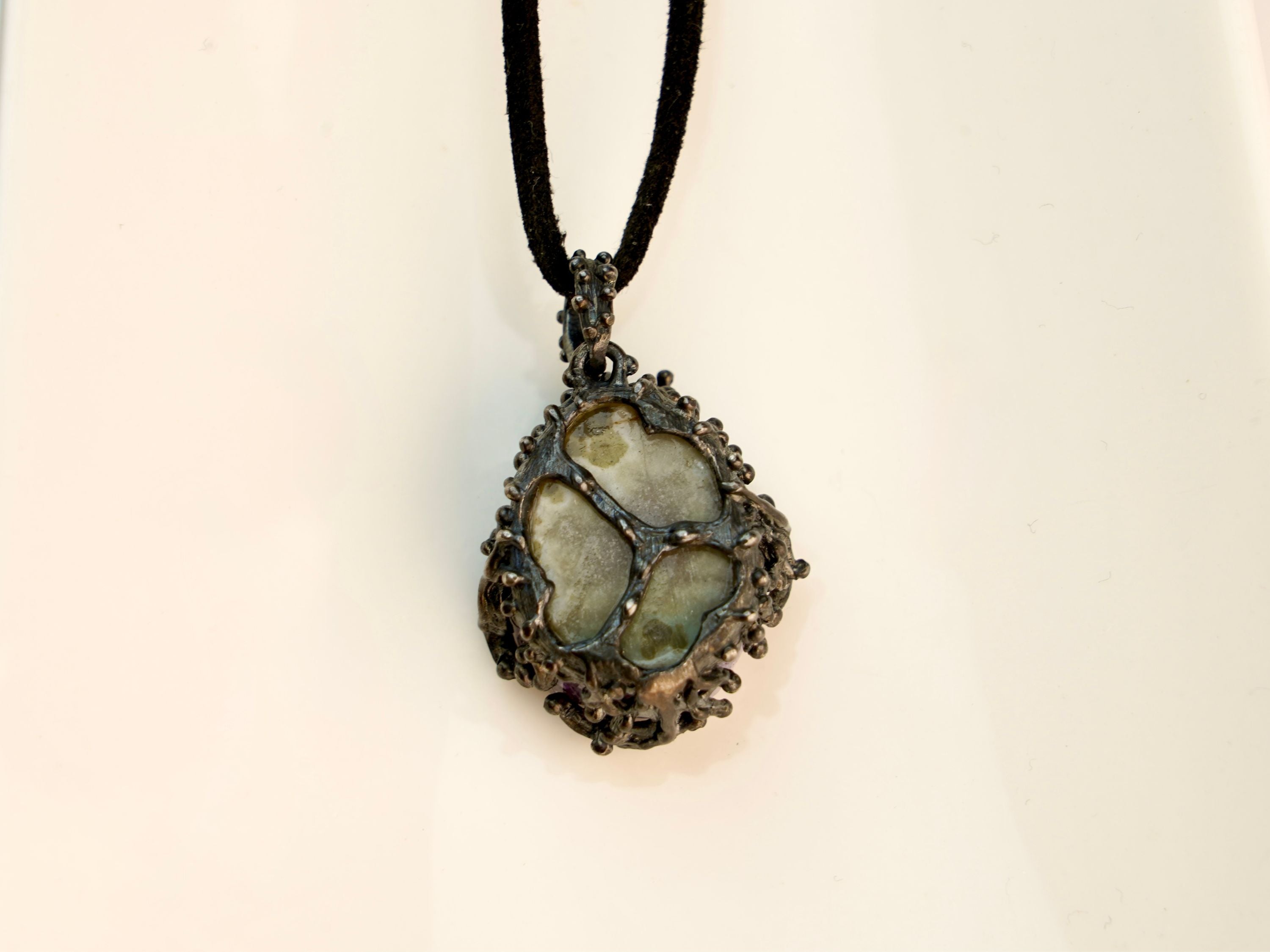 backside of amethyst pendant, sterling silver handcrafted jewelry detail