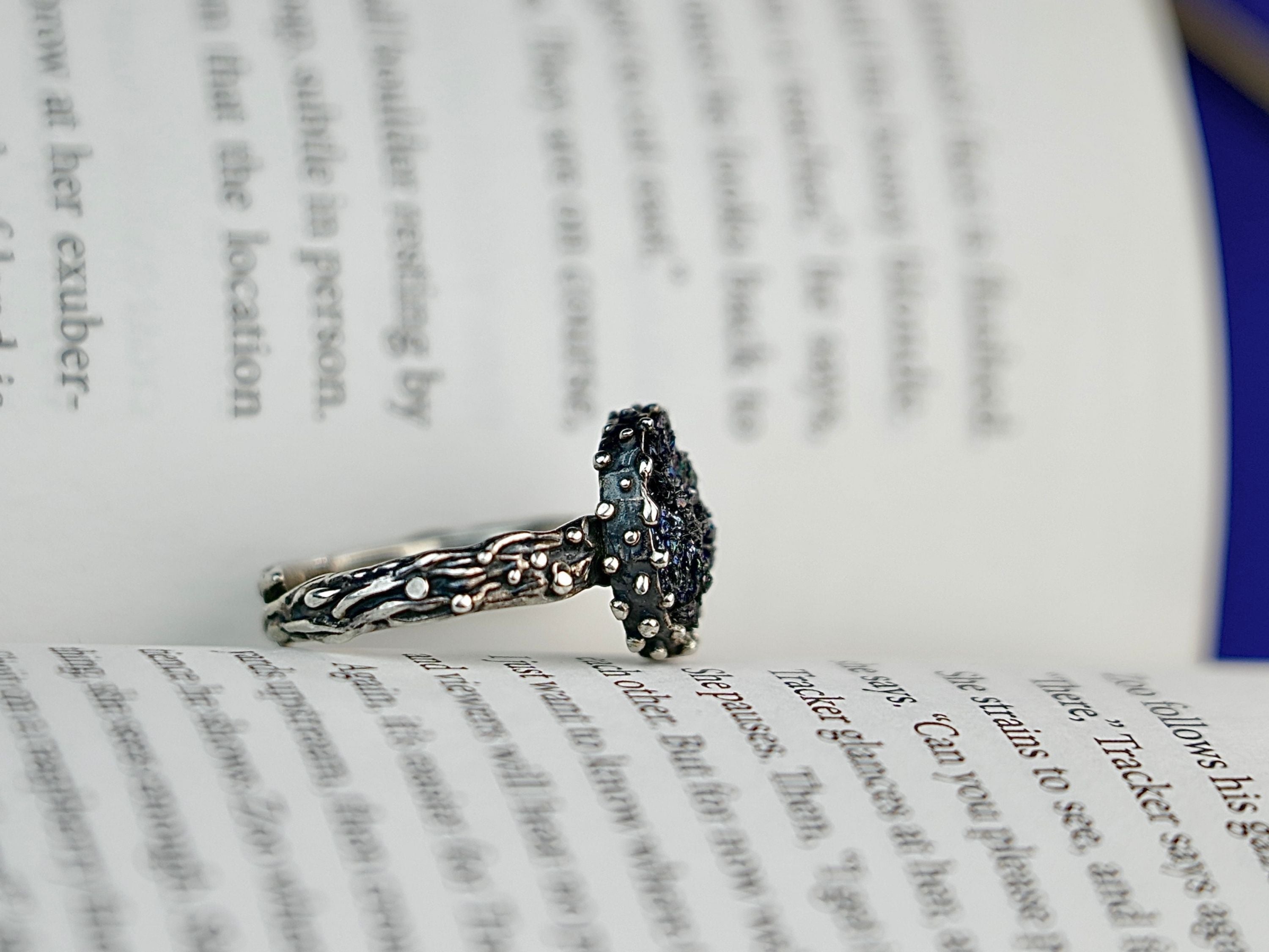 Black tourmaline adjustable ring craftsmanship silver setting detailed view