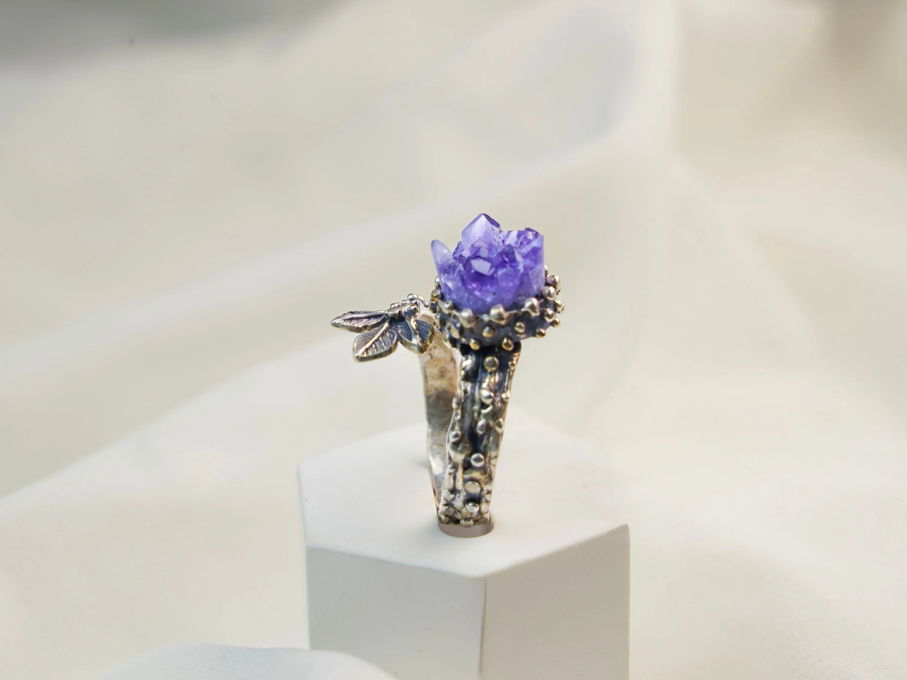 Amethyst ring front view purple gemstone sterling silver adjustable design