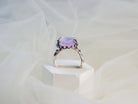 rose quartz ring profile view pink gemstone elevated setting ring