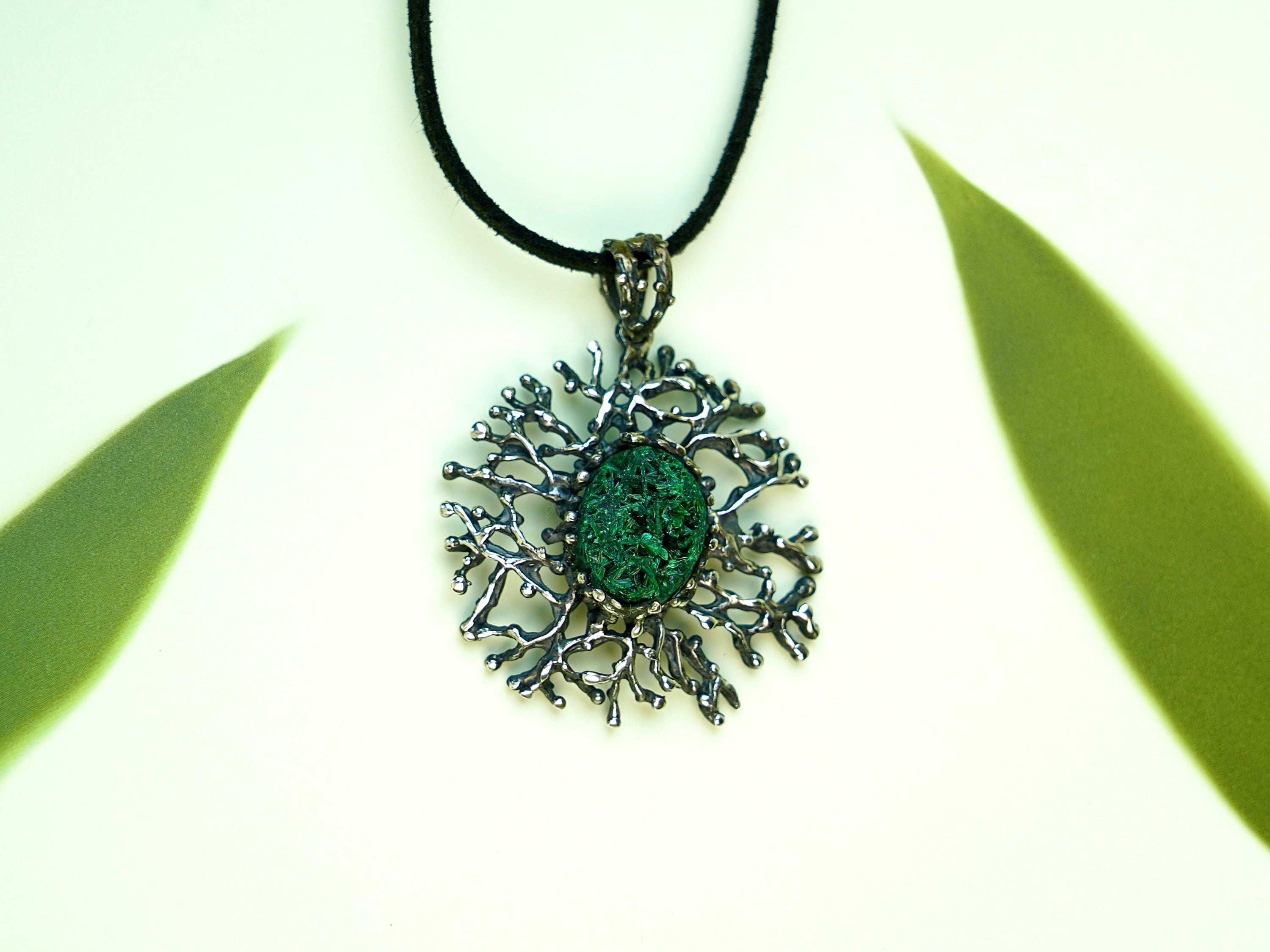 Malachite necklace detailed texture green gemstone natural pattern close up