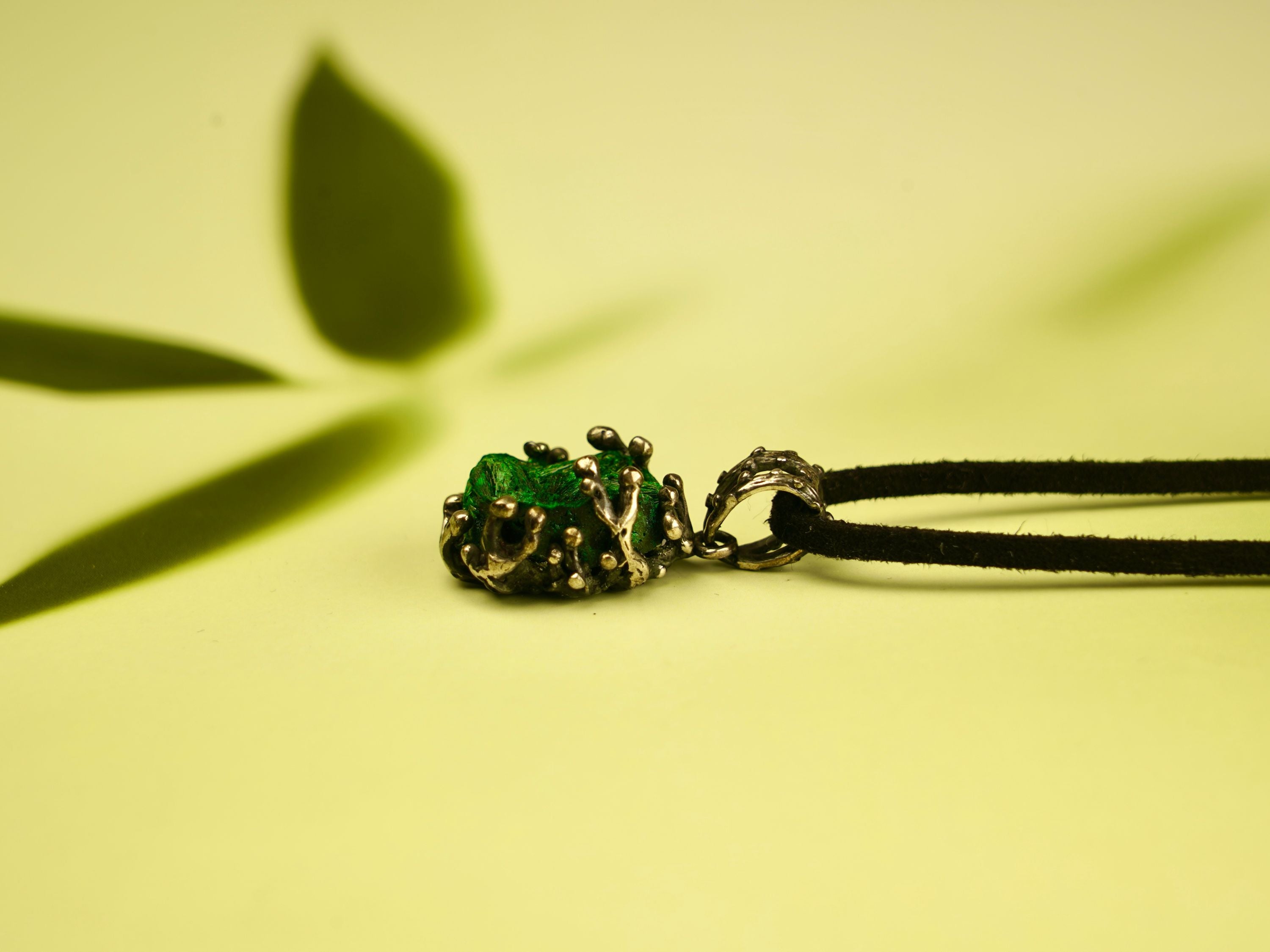 malachite necklace detailed view green gemstone texture jewelry