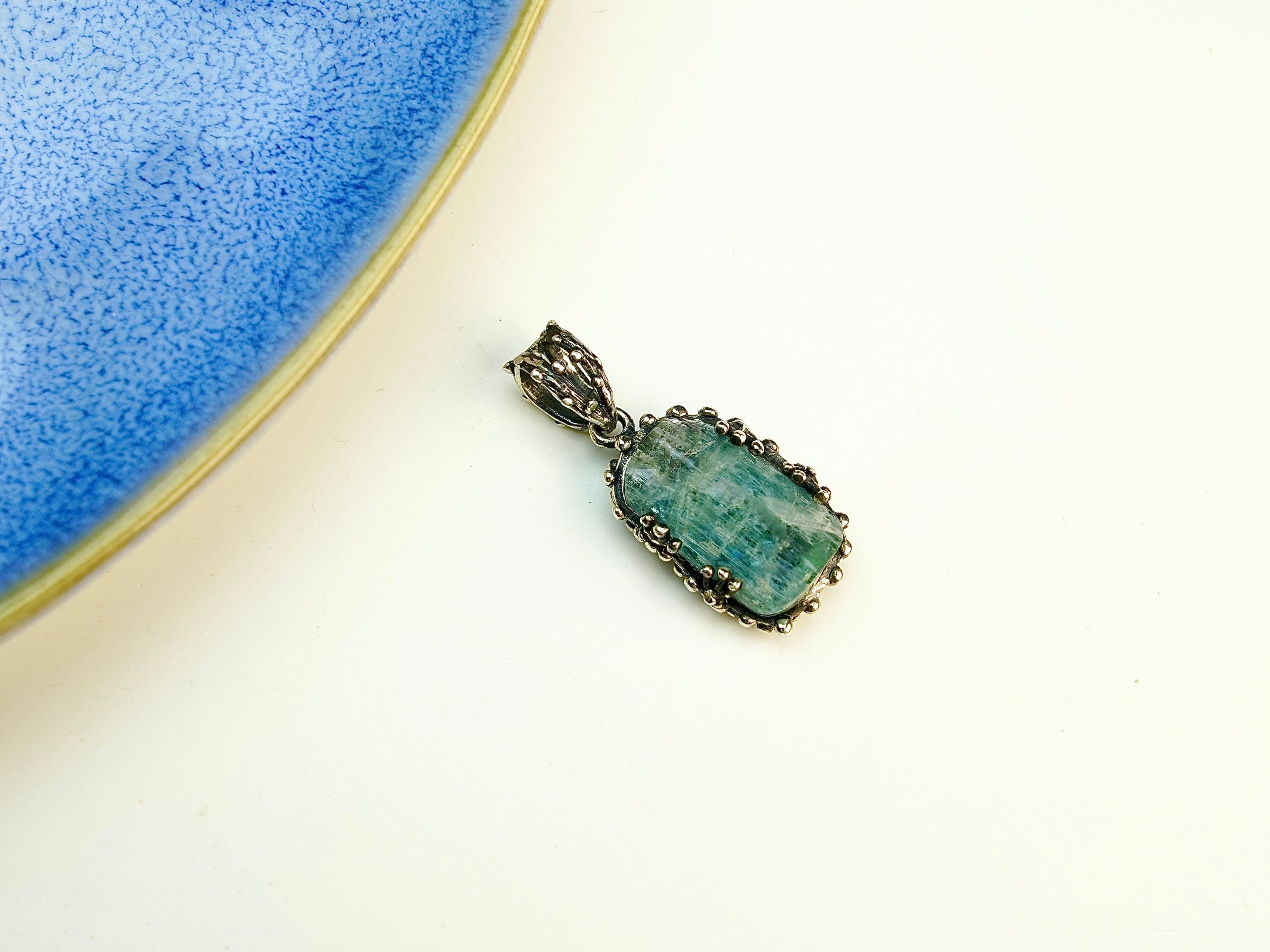 Alternative close up aquamarine crystal variation blue gemstone macro detail pendant