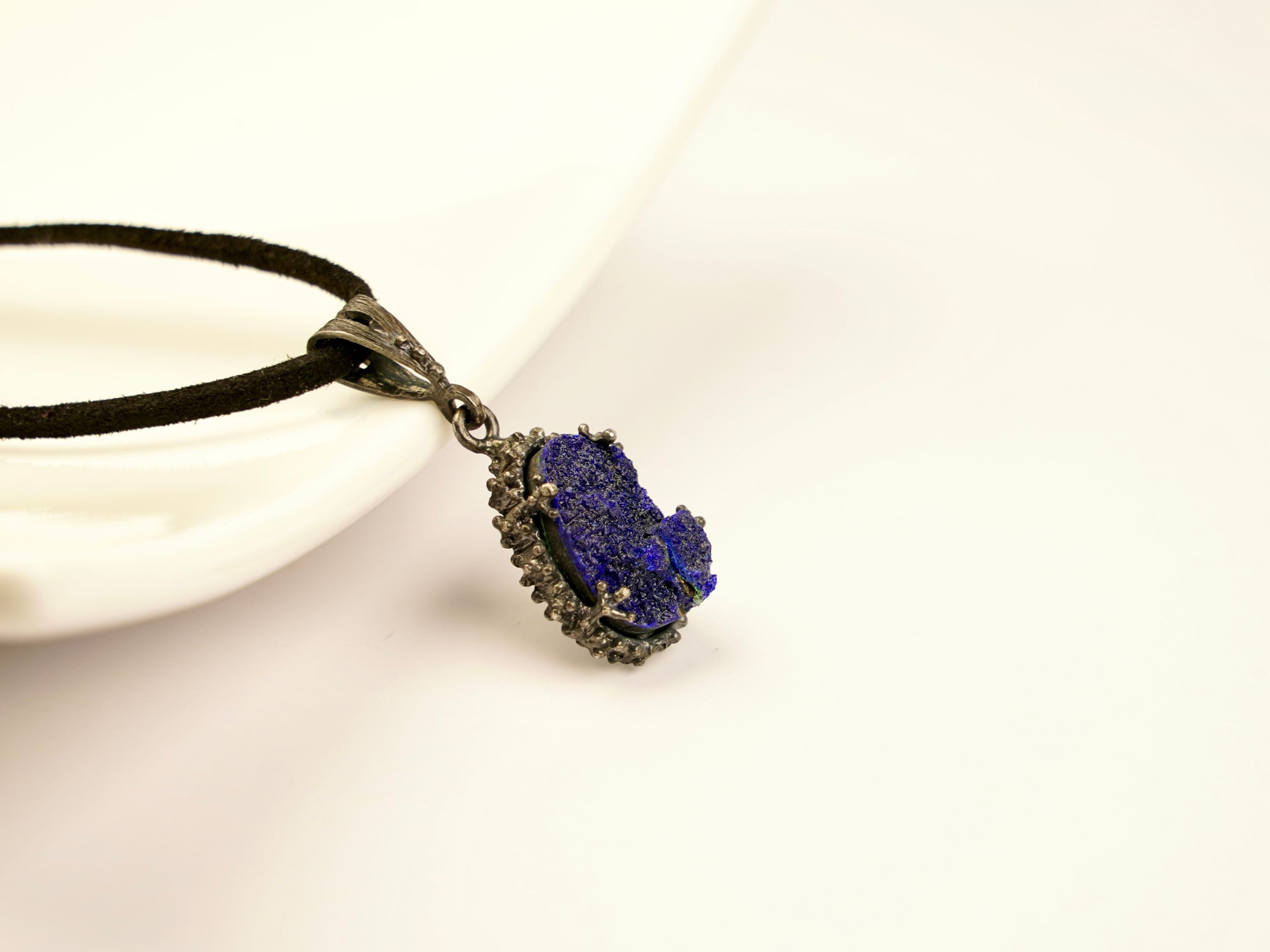 low angle lapis lazuli pendant, natural stone structure and texture
