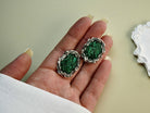 Detailed variation malachite earrings green gemstone texture macro shot