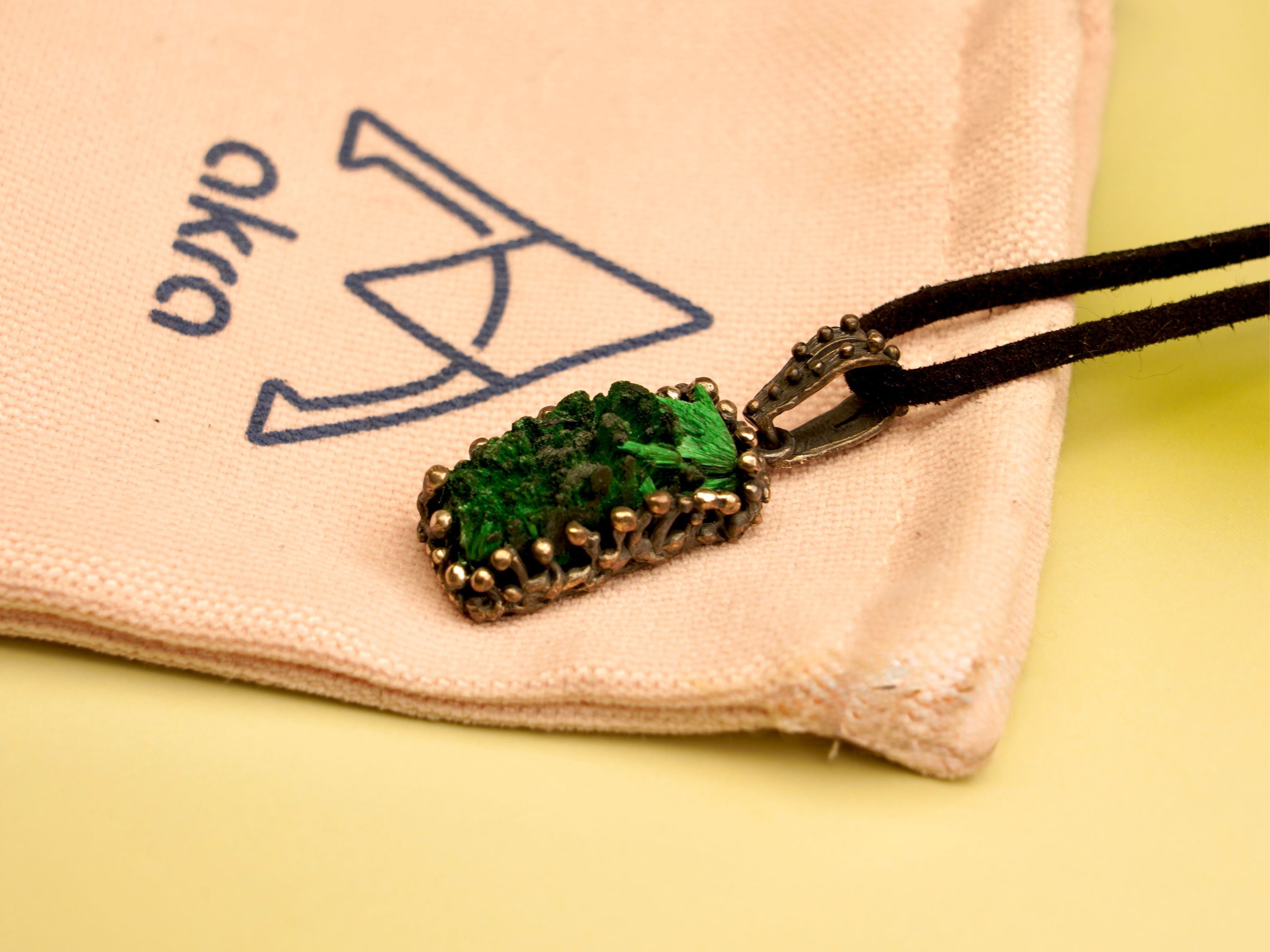malachite necklace lifestyle shot green gemstone akra jewelry brand
