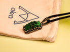 malachite necklace lifestyle shot green gemstone akra jewelry brand