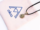 pyrite necklace lifestyle shot elegant gold jewelry akra brand