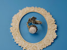 Lifestyle moonstone adjustable ring aesthetic soft glow gemstone jewelry elegant composition