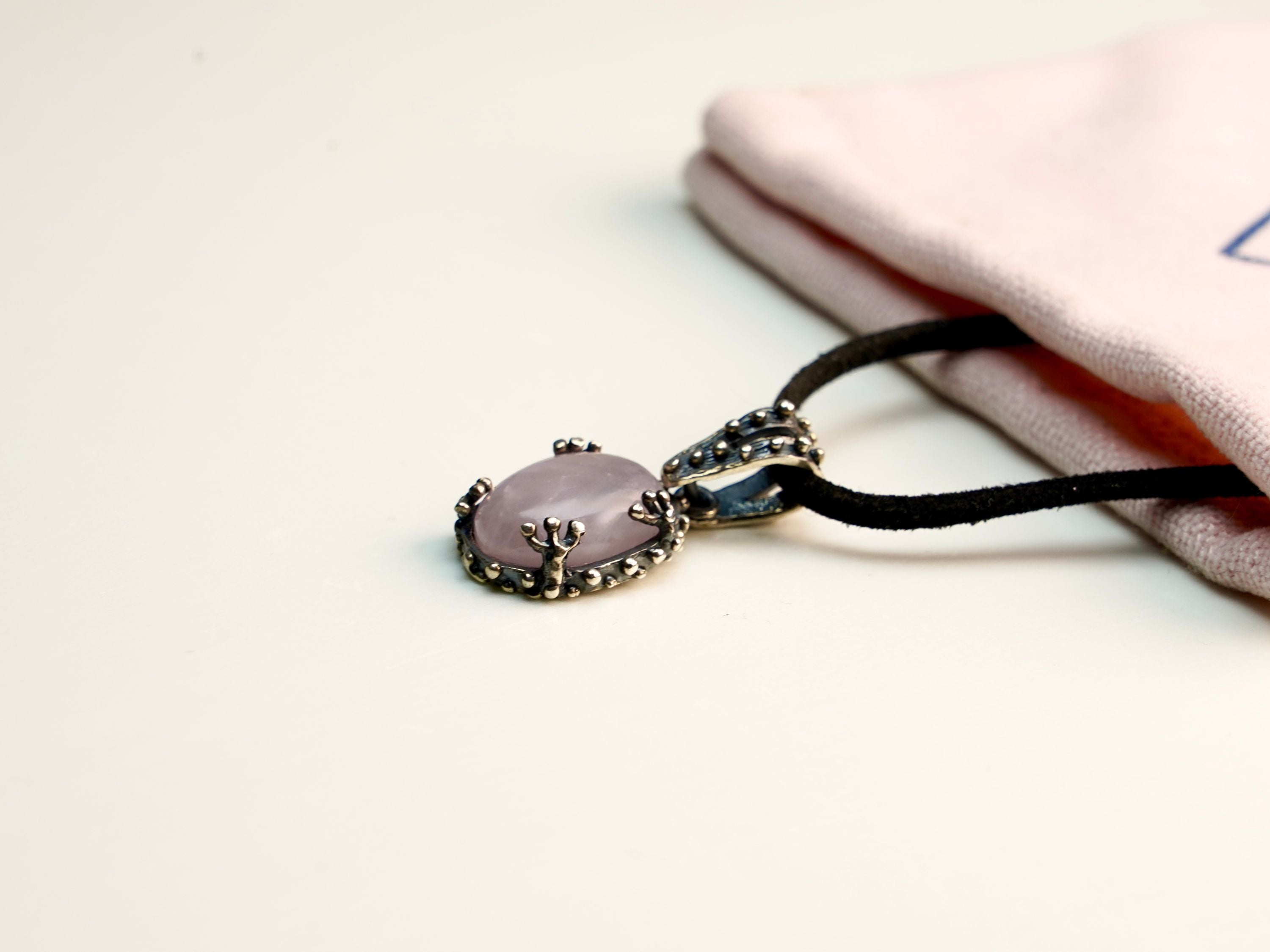 Rose quartz necklace lifestyle wear feminine pink pendant elegant everyday jewelry