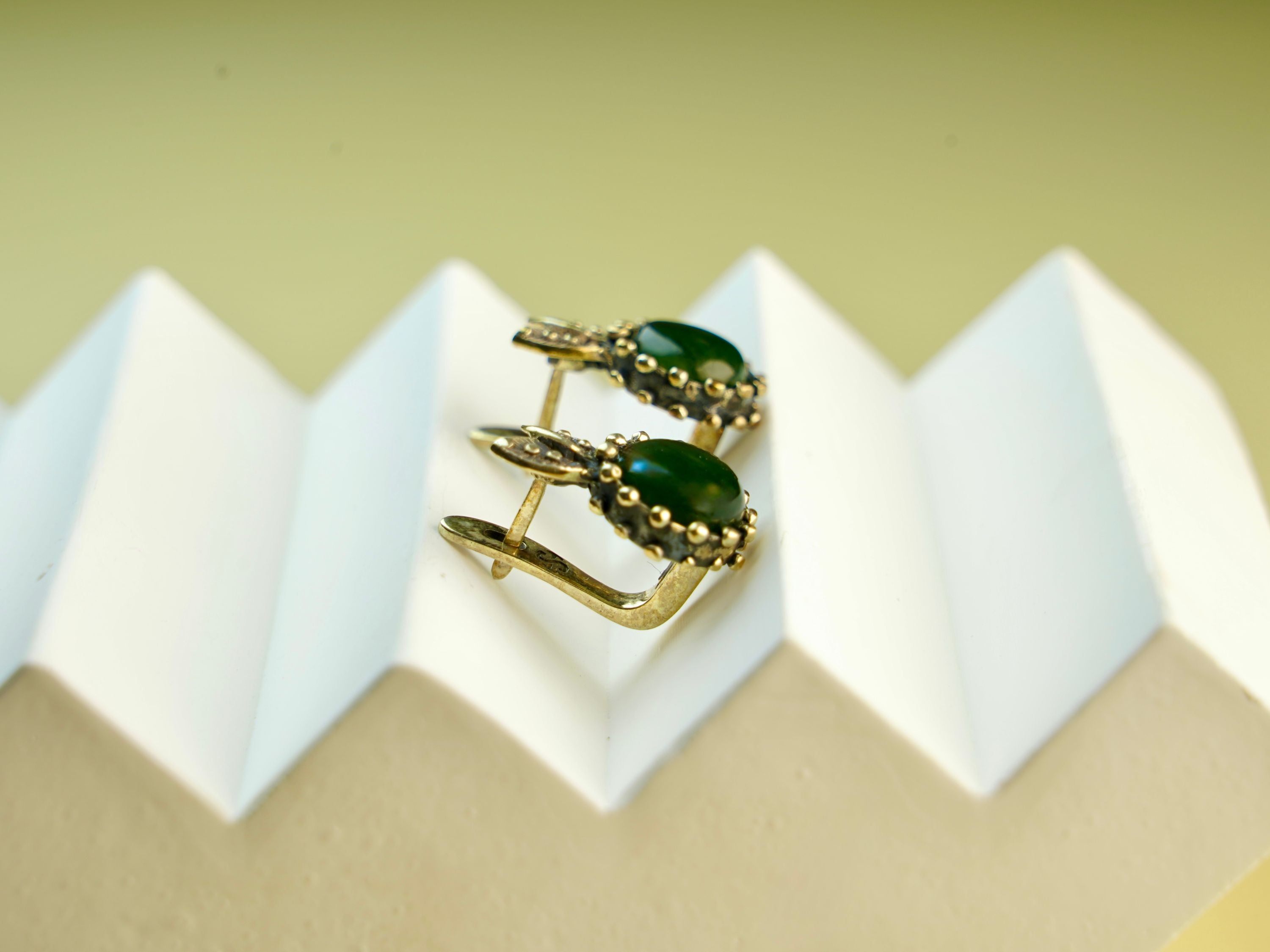 jade leverback earrings side angle green gemstone elegant design