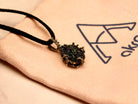 black tourmaline necklace worn on neck gothic minimalist style