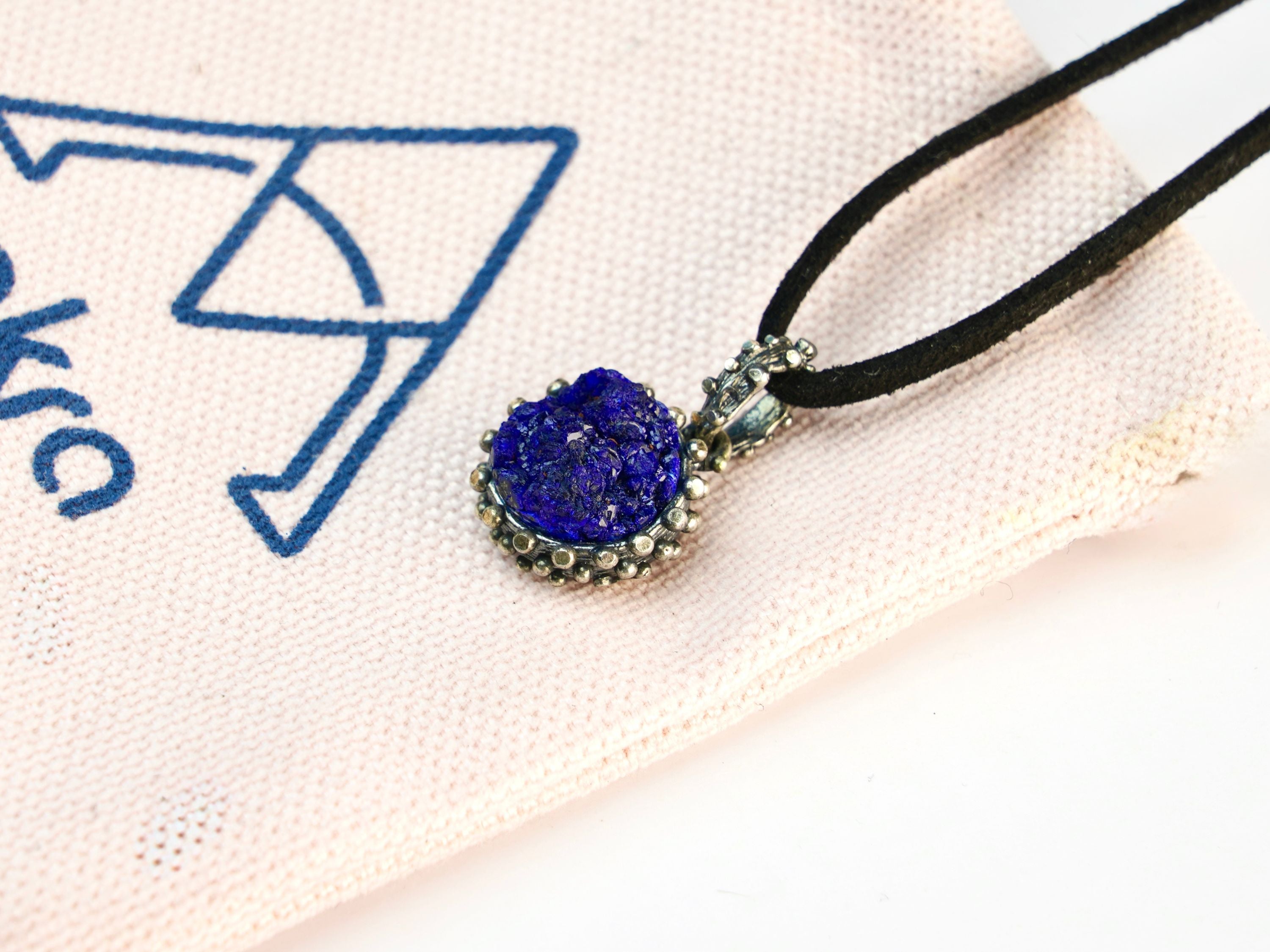 lapis lazuli necklace lifestyle shot, minimal elegant jewelry aesthetic