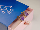 Amethyst earrings inside Akra Gems signature gift box, ready for premium gifting