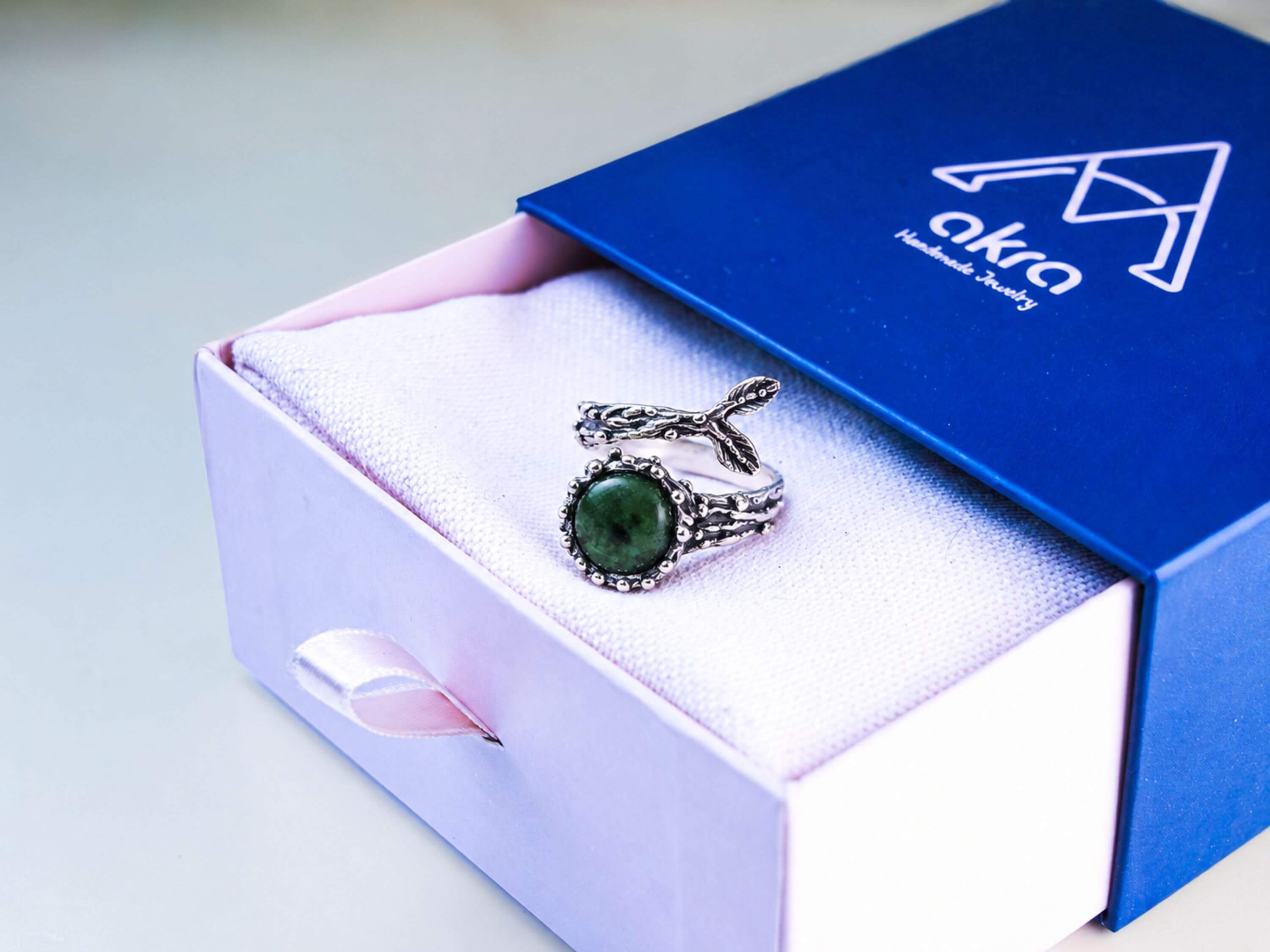 The raw Jade ring presented in Akra Gems signature gift box and luxury pouch, ready for premium gifting.
