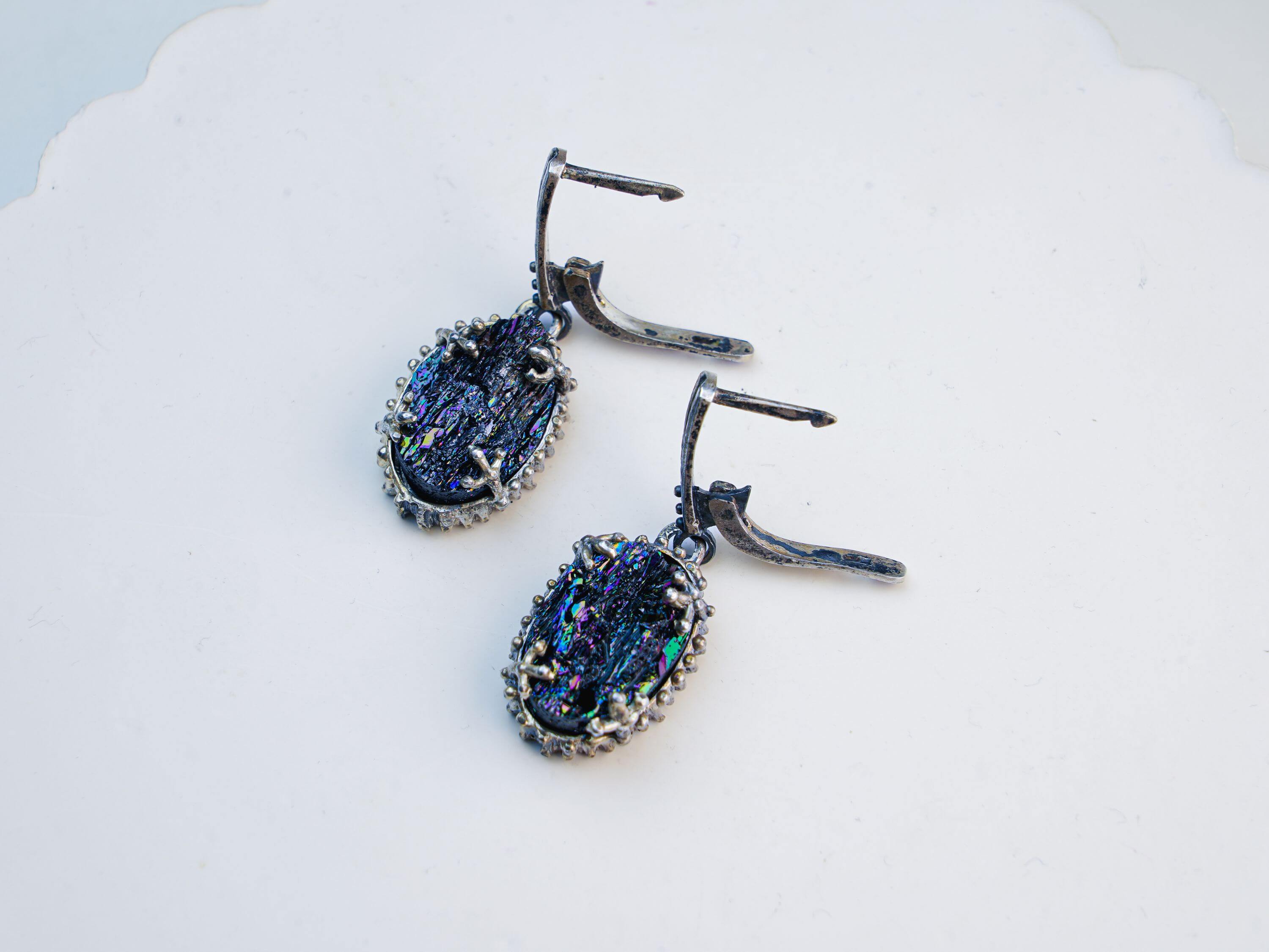 A pair of artisan-made Black Tourmaline earrings, showcasing the unique beauty of stones handcrafted in Tbilisi by Akra Gems