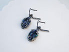 A pair of artisan-made Black Tourmaline earrings, showcasing the unique beauty of stones handcrafted in Tbilisi by Akra Gems