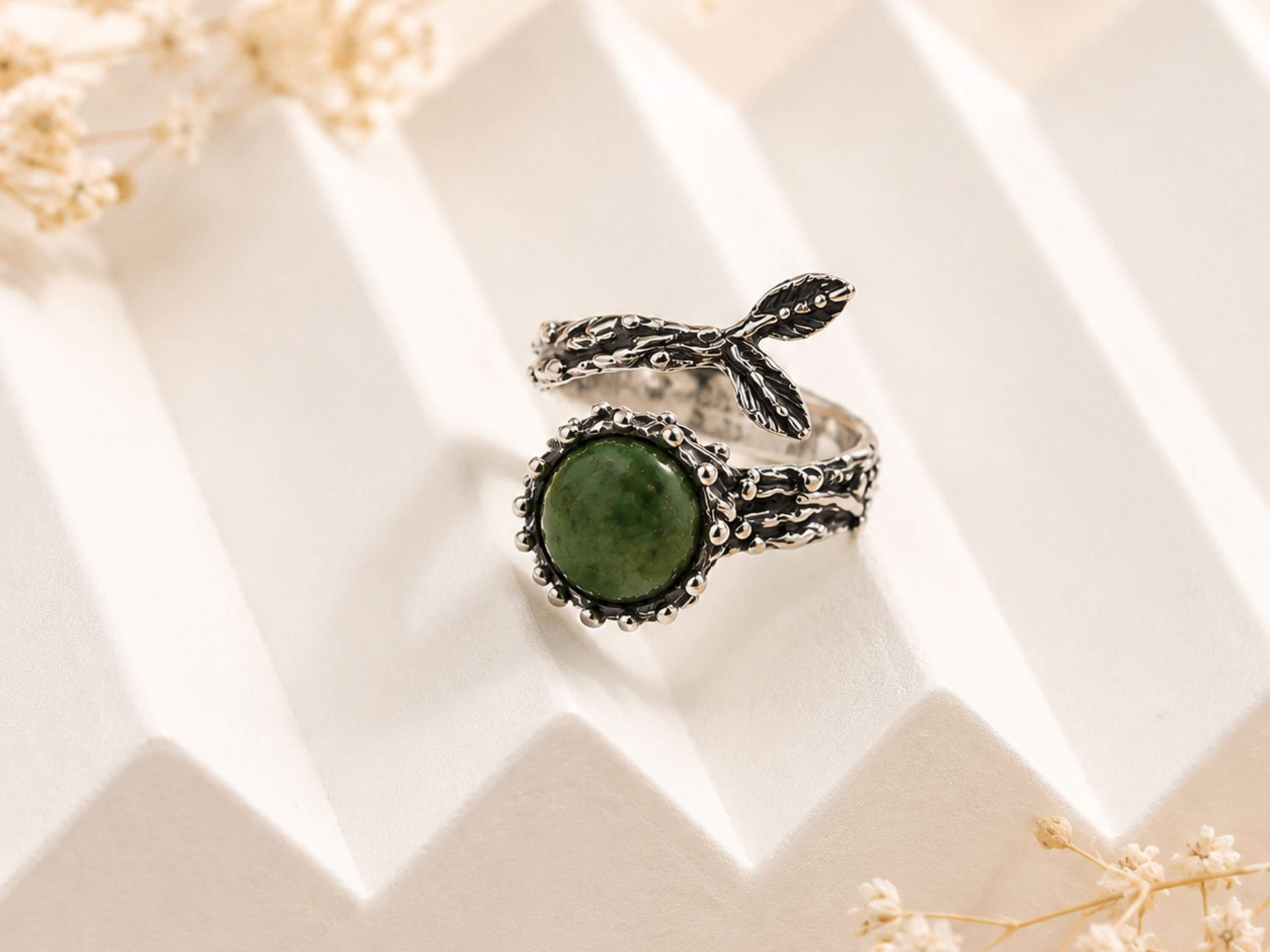 Close-up of the oxidized silver finish and artisan metalwork on the Jade ring, showcasing Akra Gems' expert craftsmanship.
