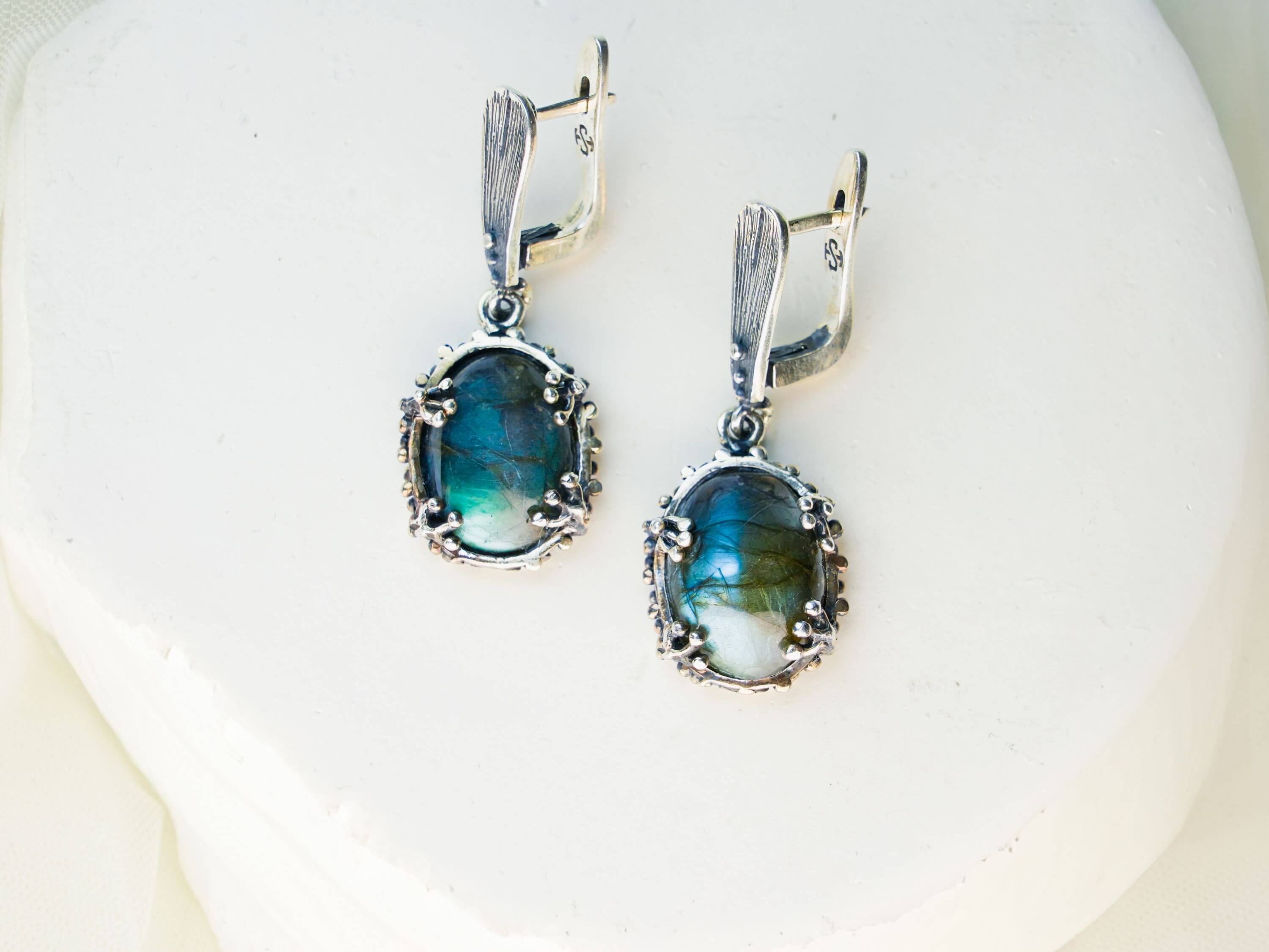 Labradorite Blue Flash Drop Earrings on a minimalist white background, high-quality sterling silver jewelry
