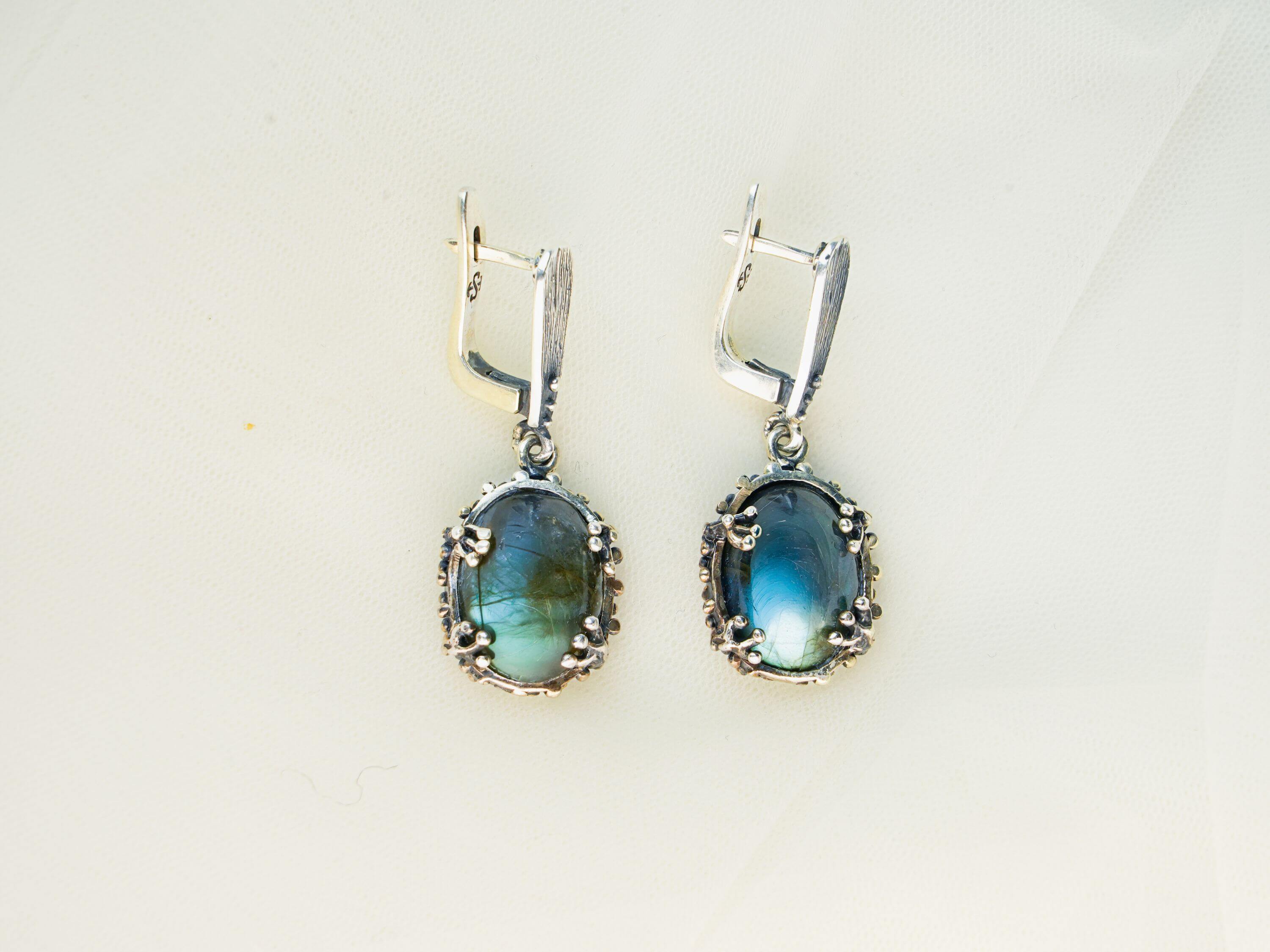 Close-up shot of natural labradorite stone with intense blue labradorescence and unique mineral texture