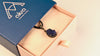 raw lapis lazuli pendant necklace in sterling silver, deep blue crystal texture and light reflection