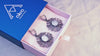 Product video showcasing the light-catching glow of natural Moonstones and the 360-degree detail of the sterling silver branch design as the earrings move