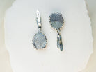 Detailed view of the secure sterling silver earring closure and polished back finish of Akra jewelry